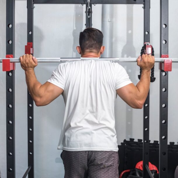 squat-stand-vs.-power-rack:-how-to-choose-your-gym's-command-center-–-breaking-muscle